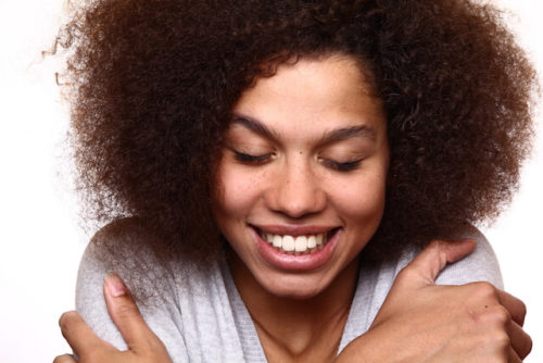 Woman-Hugging-Herself